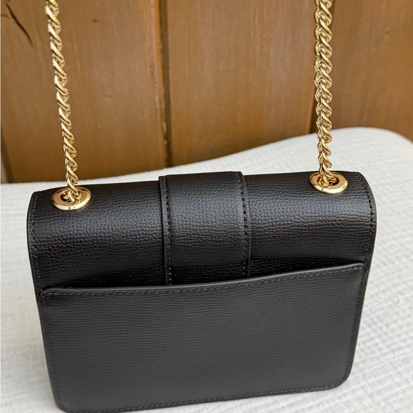 Kate Spade New York Phoebe Turnlock Mini Flap Crossbody Bag
Originally $320 - Picture 8 of 12